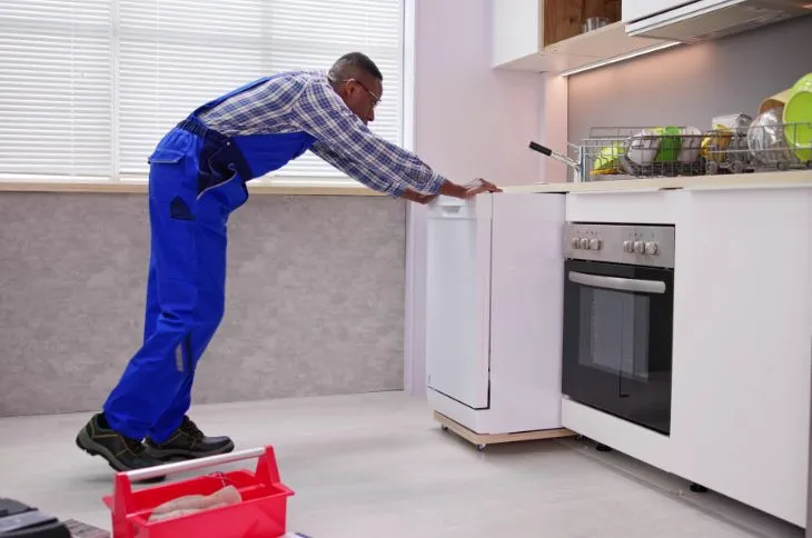 Moving company installs dishwasher